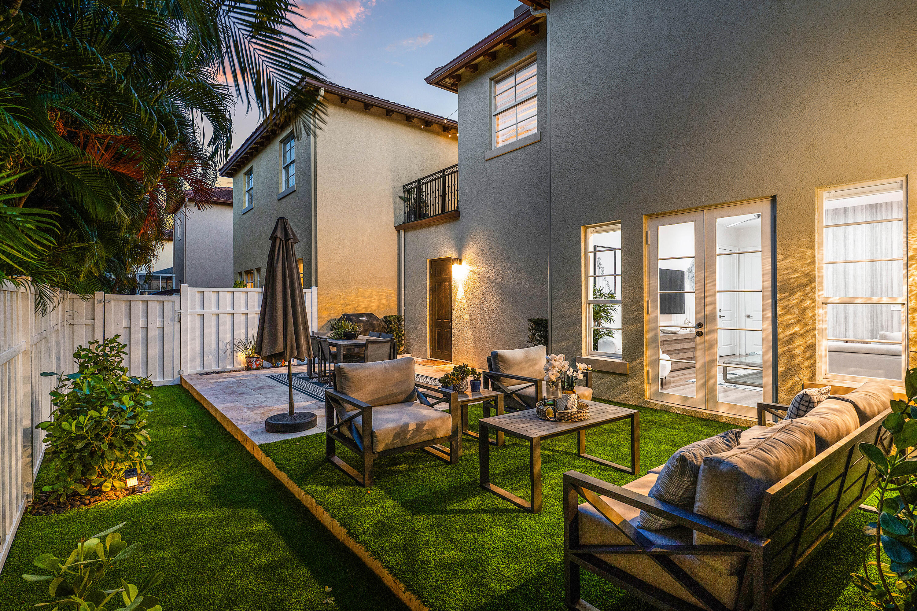 121 Via Poinciana Lane Boca Raton, FL 33487 - Photo 47 of 59 a building outdoor space with patio furniture