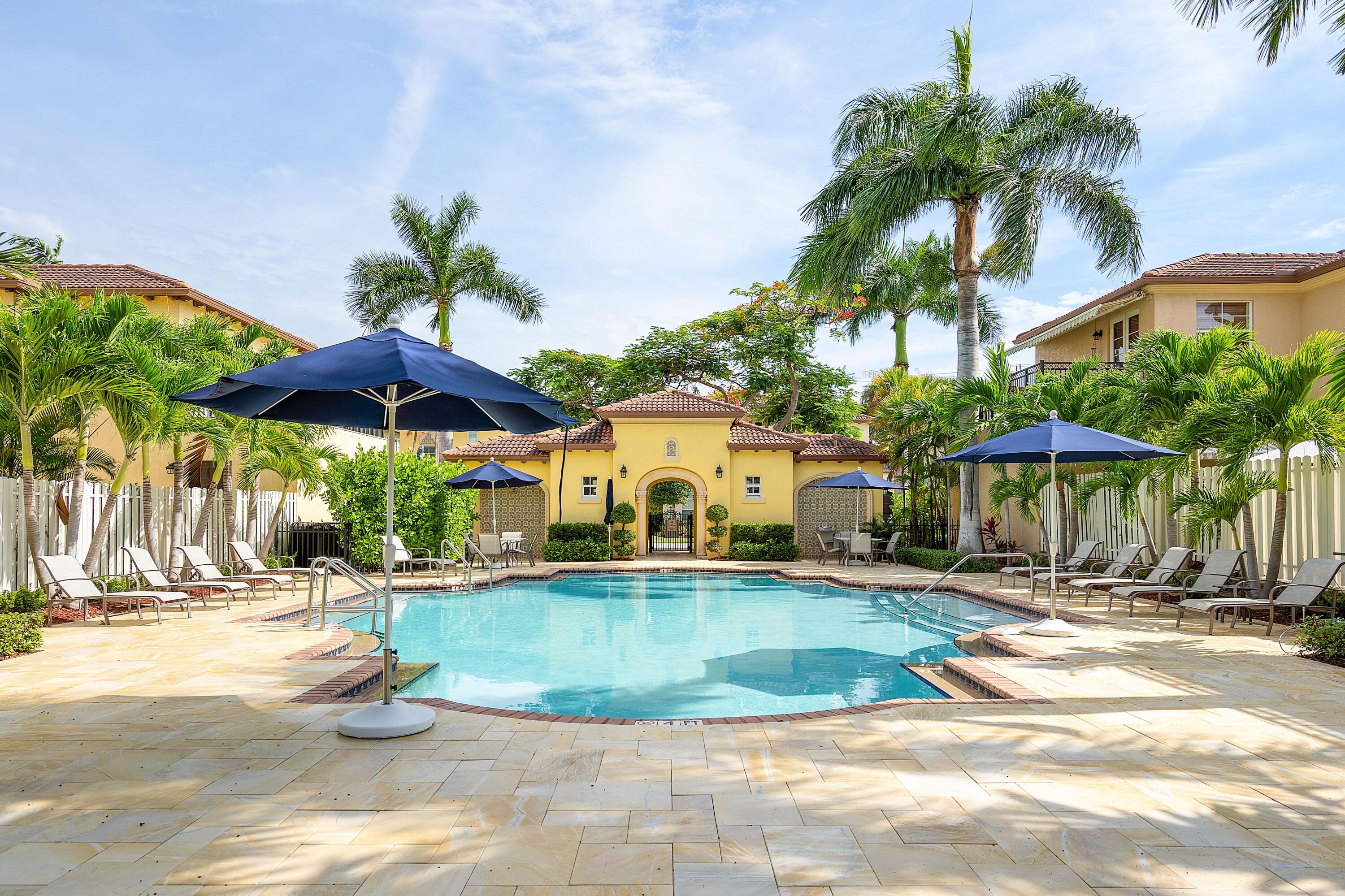 121 Via Poinciana Lane Boca Raton, FL 33487 - Photo 53 of 59 a view of a house with backyard and sitting area
