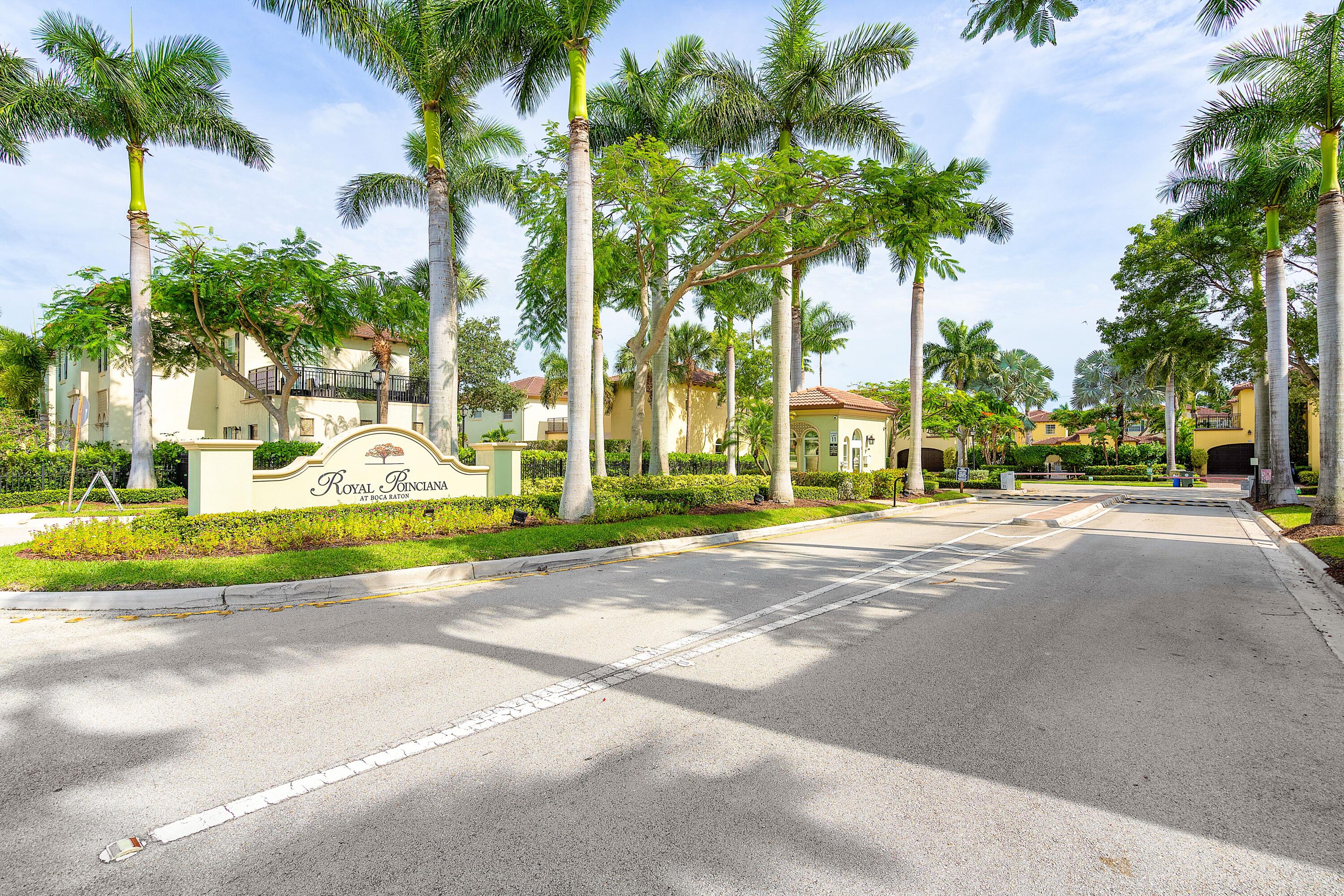 121 Via Poinciana Lane Boca Raton, FL 33487 - Photo 55 of 59 a view of a house with a palm trees