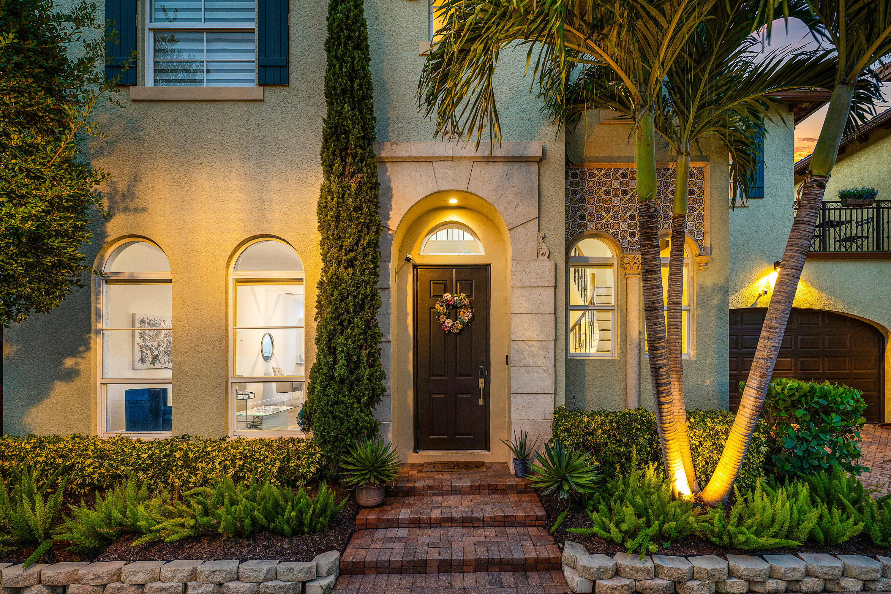 121 Via Poinciana Lane Boca Raton, FL 33487 - Photo 6 of 59 a front view of a house