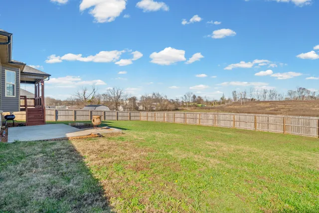a view of a lake with a big yard