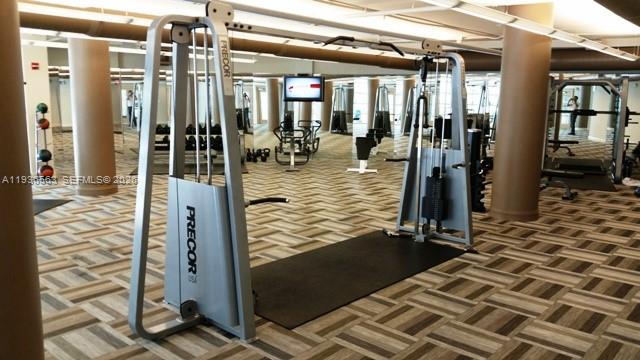 253 Northeast 2nd Street, Unit 4303 Miami, FL 33132 - Photo 28 of 35 a view of a porch with a table and chairs