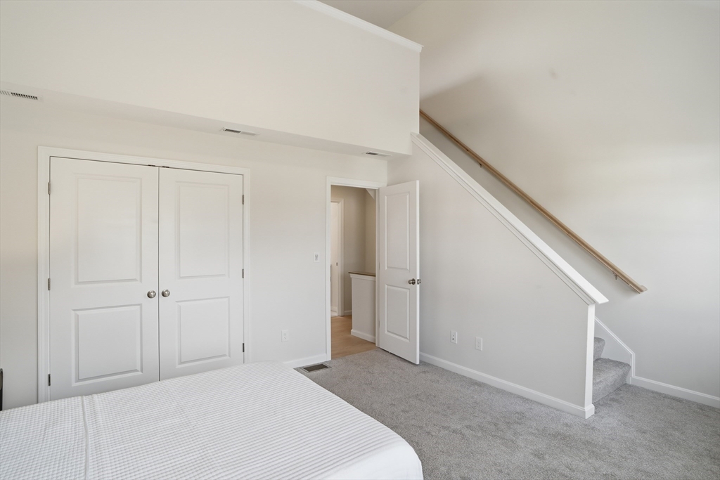 21 Ambrose Way, Unit 21 Shirley, MA 01464 - Photo 19 of 31 a big room with closet and windows