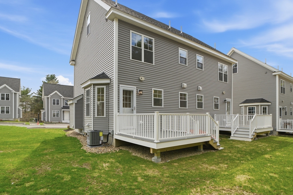 21 Ambrose Way, Unit 21 Shirley, MA 01464 - Photo 24 of 31 a view of a house with a yard