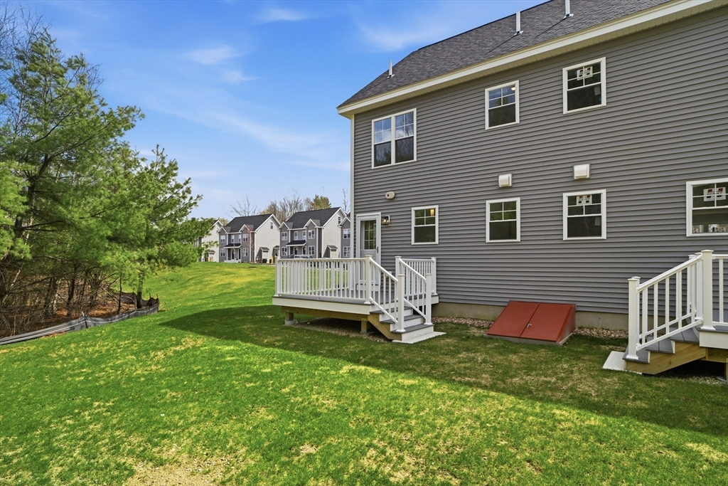 21 Ambrose Way, Unit 21 Shirley, MA 01464 - Photo 26 of 31 a front view of house with yard