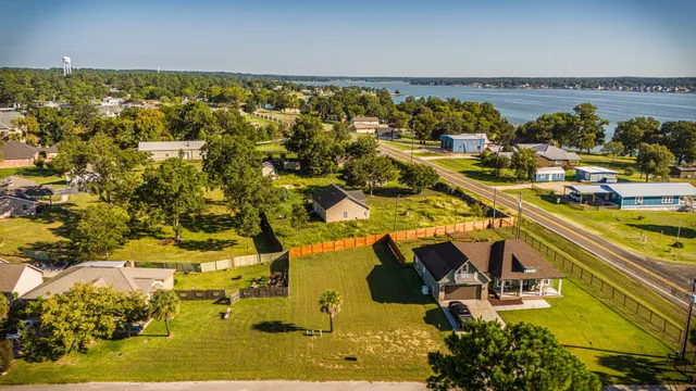 a balcony with table and chairs