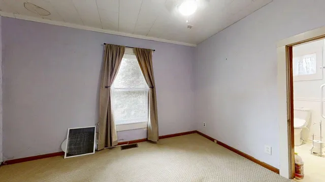 an empty room with window