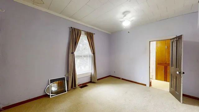 an empty room with windows