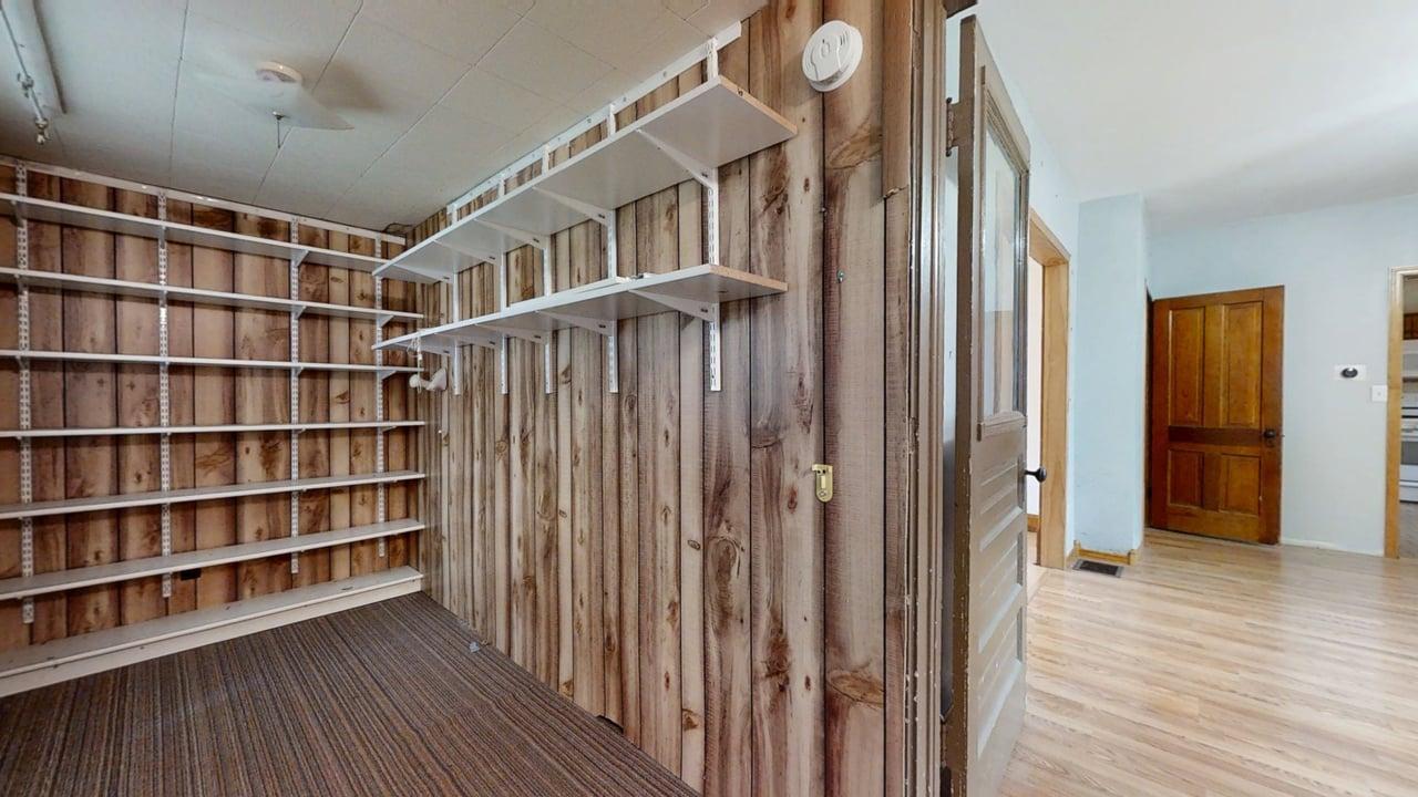 320 North Main Street Gifford, IL 61847 - Photo 4 of 42 a view of a livingroom with a bookshelf