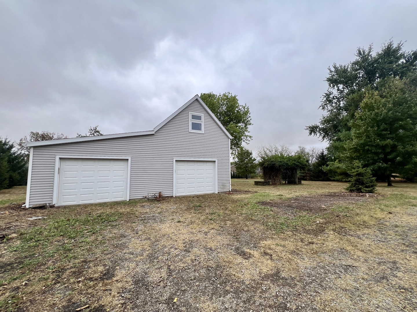 320 North Main Street Gifford, IL 61847 - Photo 41 of 42 a house with yard and a trees