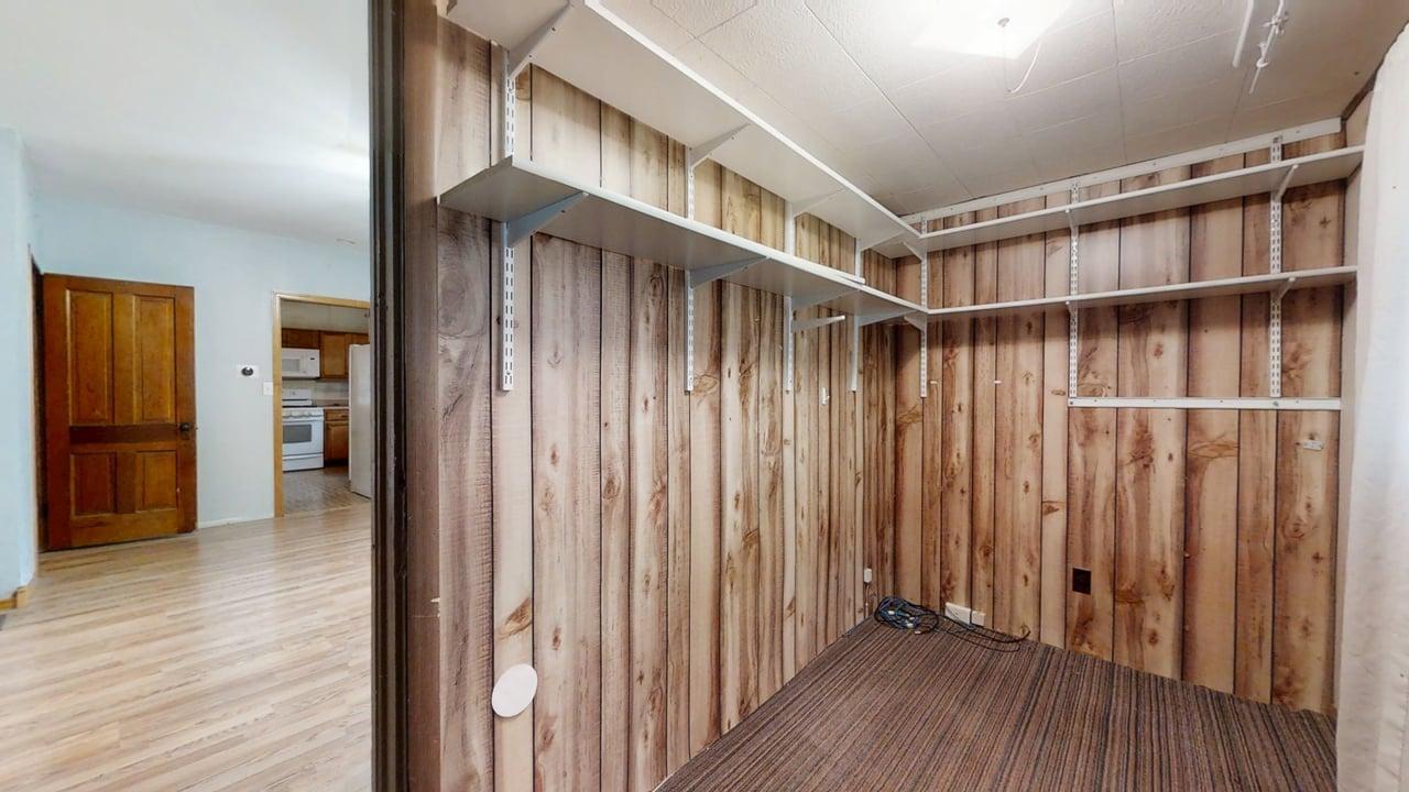 320 North Main Street Gifford, IL 61847 - Photo 5 of 42 a view of a hallway with wooden floor and staircase