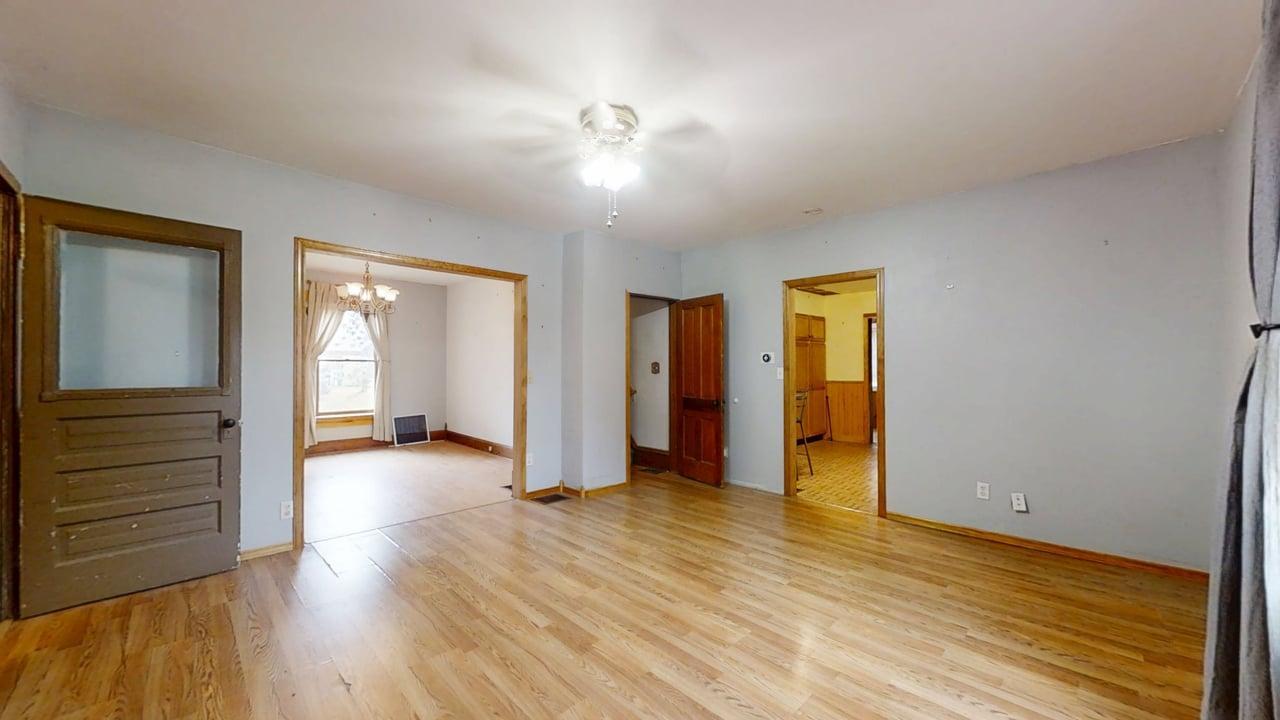 320 North Main Street Gifford, IL 61847 - Photo 8 of 42 a view of a livingroom with wooden floor