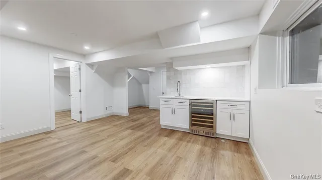 a view of a kitchen with a sink