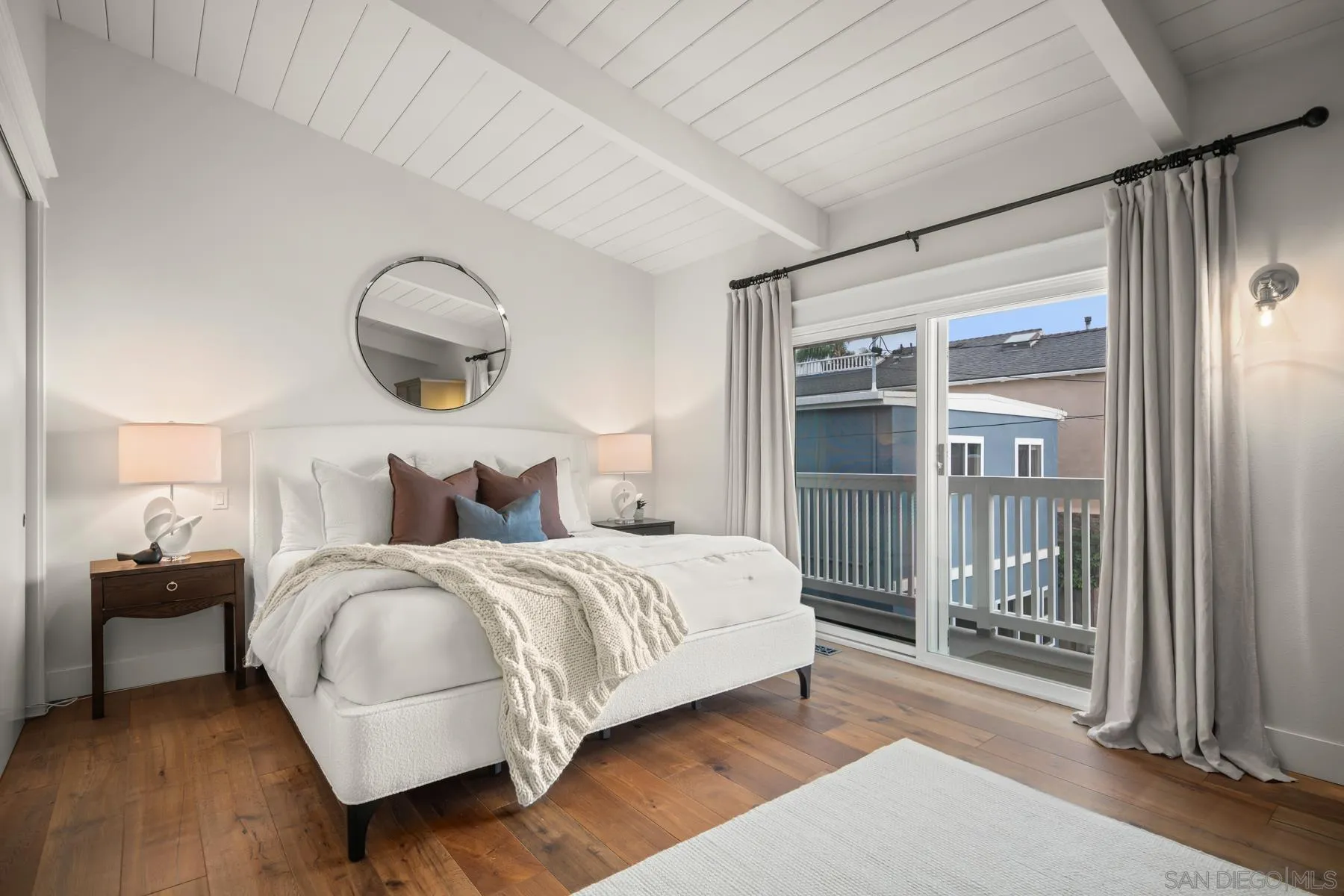 420 1st Street Coronado, CA 92118 - Photo 18 of 38 a bedroom with bed and a large window