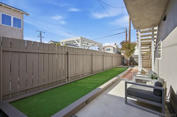 a view of backyard with cabin