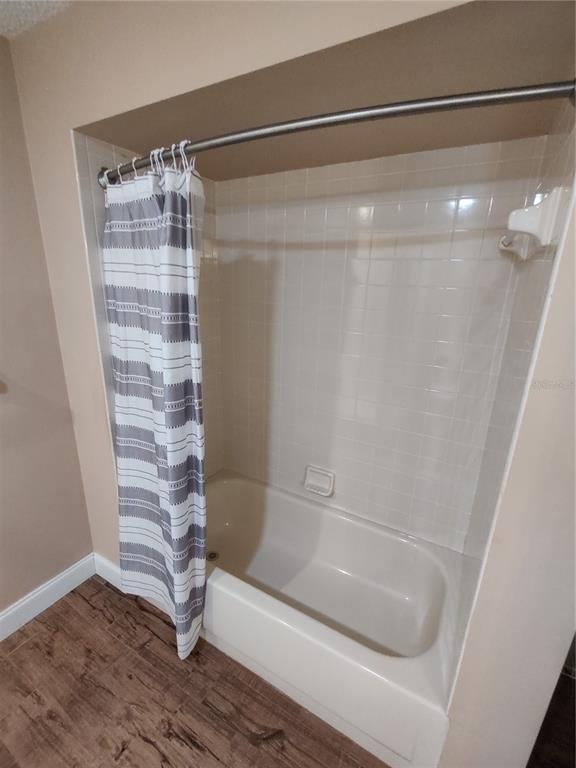 8792 Southwest 116th Place Road Ocala, FL 34481 - Photo 23 of 36 a bathroom with a shower and a bath tub