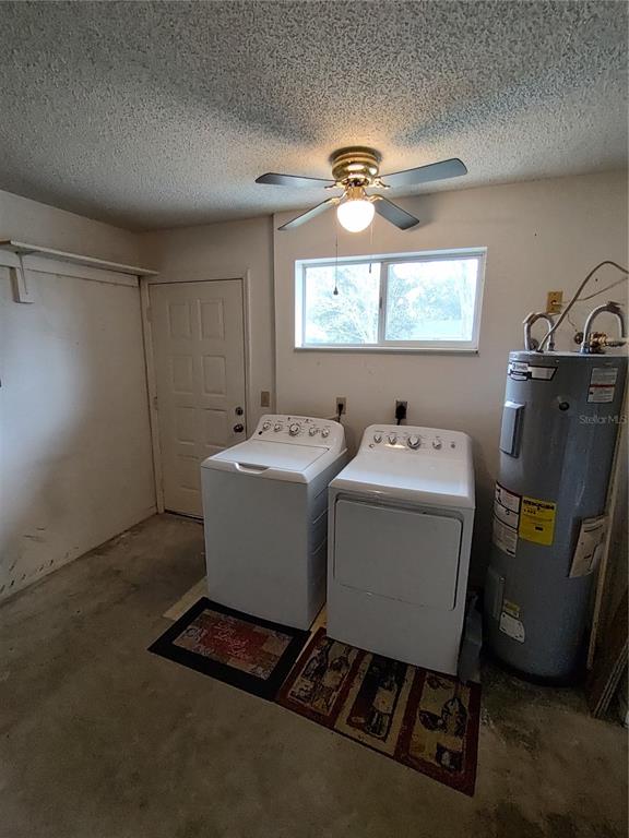 8792 Southwest 116th Place Road Ocala, FL 34481 - Photo 34 of 36 a utility room with dryer and washer