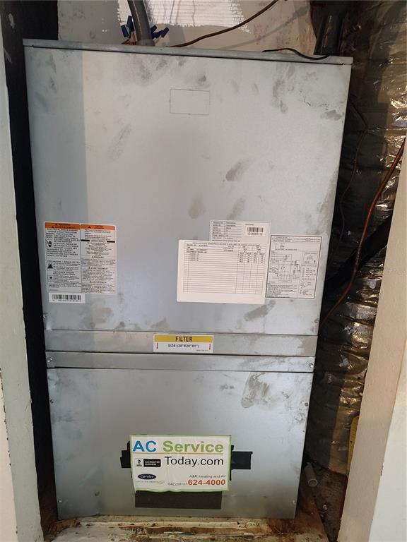 8792 Southwest 116th Place Road Ocala, FL 34481 - Photo 35 of 36 a view of water heater room