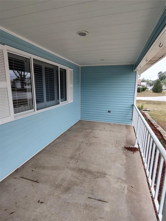 8792 Southwest 116th Place Road Ocala, FL 34481 - Photo 5 of 36 a view of an empty room with stairs