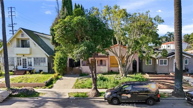 a car parked in front of a house