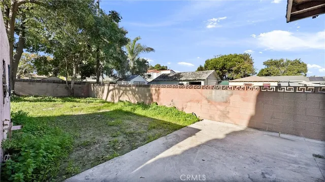 a view of a backyard with a garden