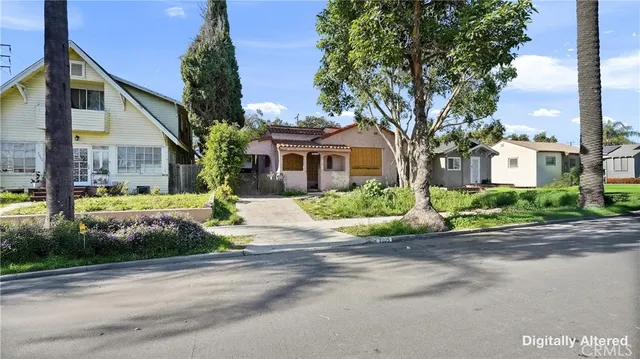 front view of a house with a small yard