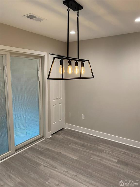 218 Edpas Road New Brunswick, NJ 08901 - Photo 16 of 17 a view of a room with wooden floor