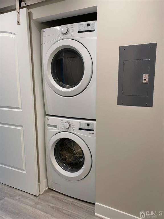 218 Edpas Road New Brunswick, NJ 08901 - Photo 5 of 17 a utility room with dryer and washer