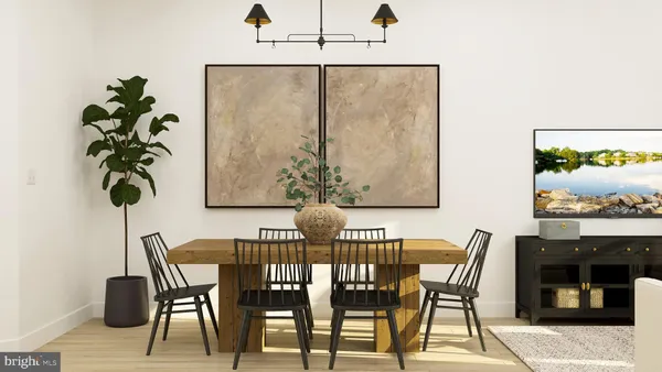 a view of a dining room with furniture and window