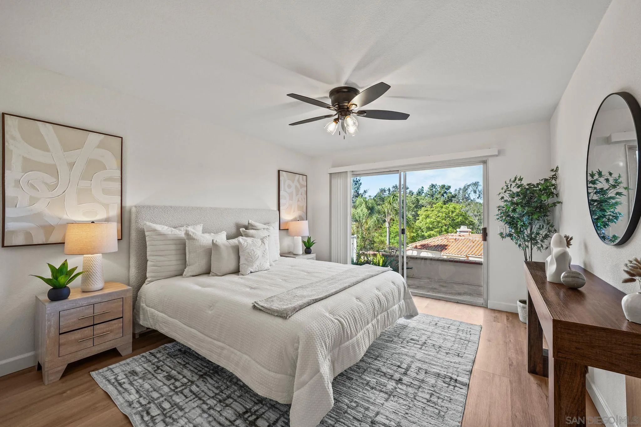 1274 Rue St Moritz San Marcos, CA 92078 - Photo 17 of 39 a bedroom with a bed a couch and a chandelier