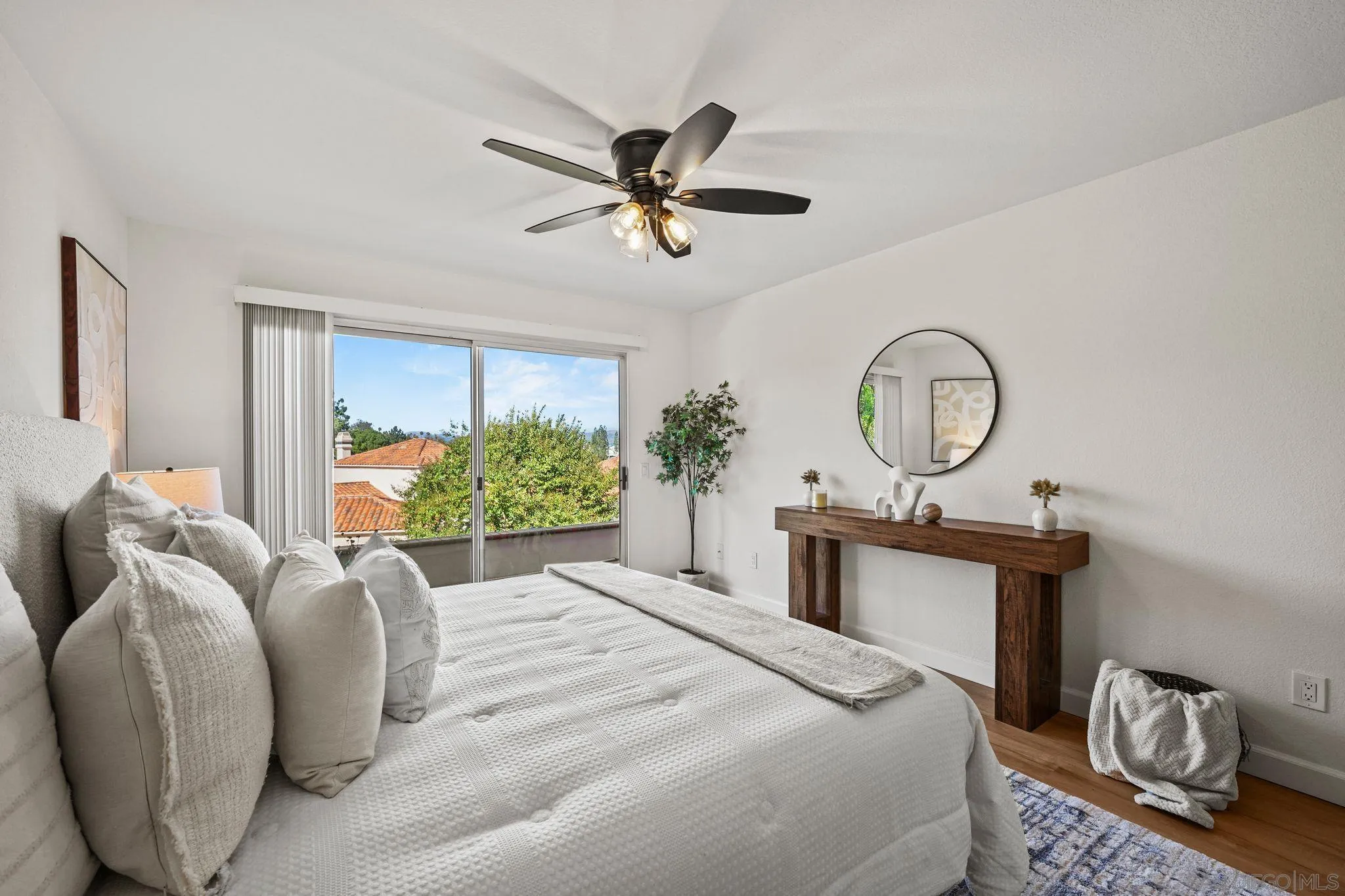 1274 Rue St Moritz San Marcos, CA 92078 - Photo 18 of 39 a bedroom with a bed mirror dresser and a window