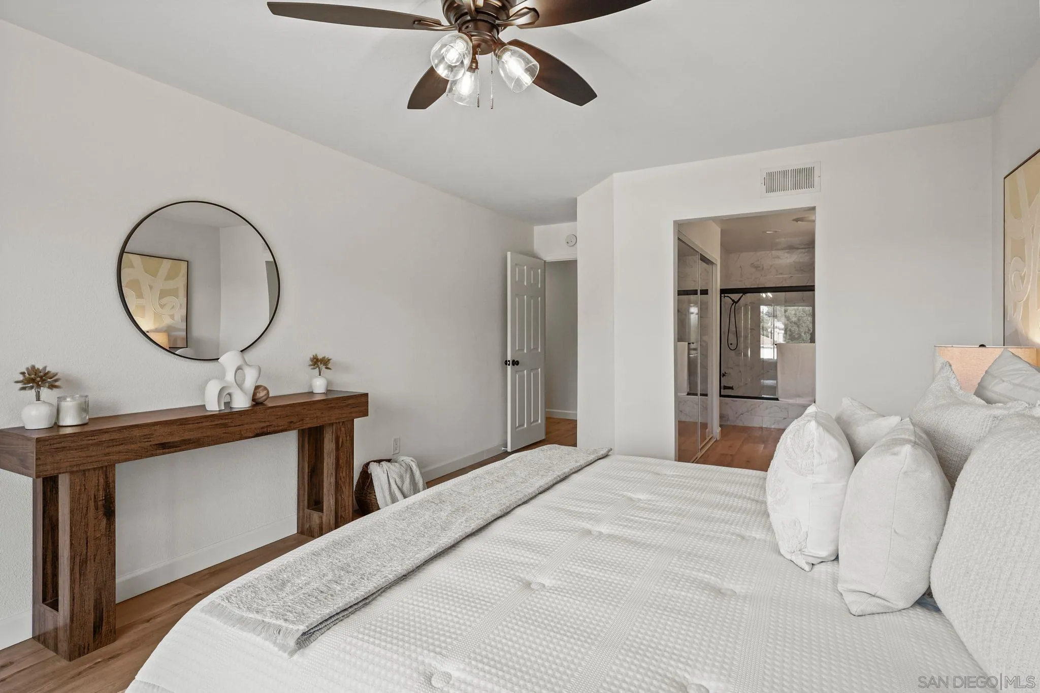 1274 Rue St Moritz San Marcos, CA 92078 - Photo 19 of 39 a bedroom with a bed and a chandelier