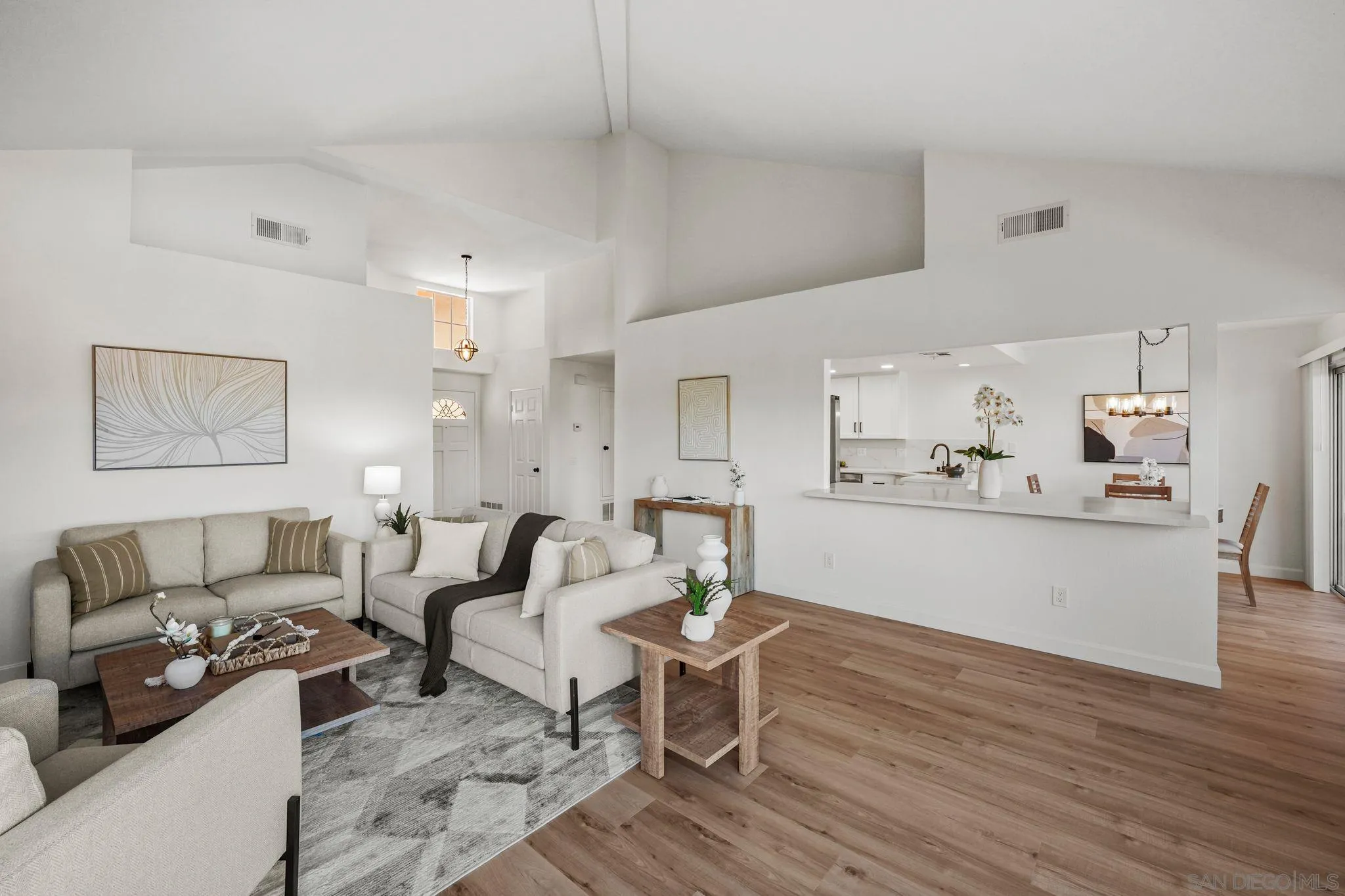 1274 Rue St Moritz San Marcos, CA 92078 - Photo 4 of 39 a living room with furniture and a wooden floor