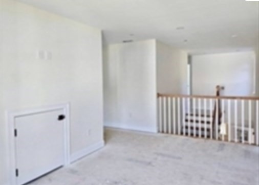 94 Willow Street, Unit 2 Acton, MA 01720 - Photo 13 of 24 a view of a hallway