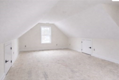 94 Willow Street, Unit 2 Acton, MA 01720 - Photo 18 of 24 a view of empty room with window