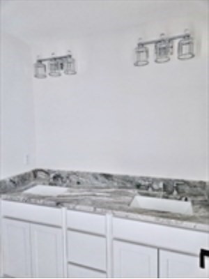94 Willow Street, Unit 2 Acton, MA 01720 - Photo 20 of 24 a view of kitchen countertops with stove