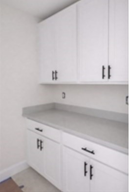 94 Willow Street, Unit 2 Acton, MA 01720 - Photo 9 of 24 a view of white cabinets