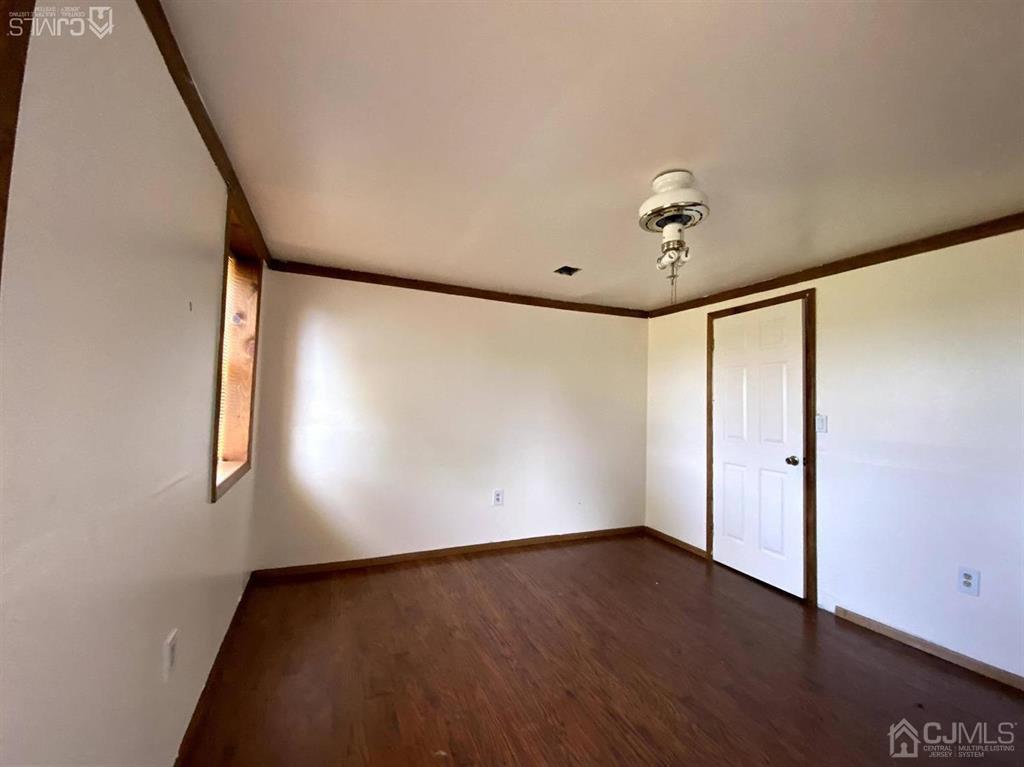 200 North Pemberton Road Pemberton, NJ 08068 - Photo 18 of 27 an empty room with wooden floor and windows