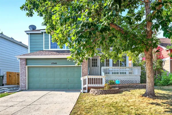a front view of a house with a porch