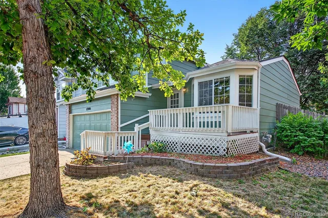 front view of a house with a small yard