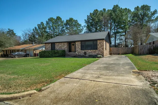 a front view of house with yard