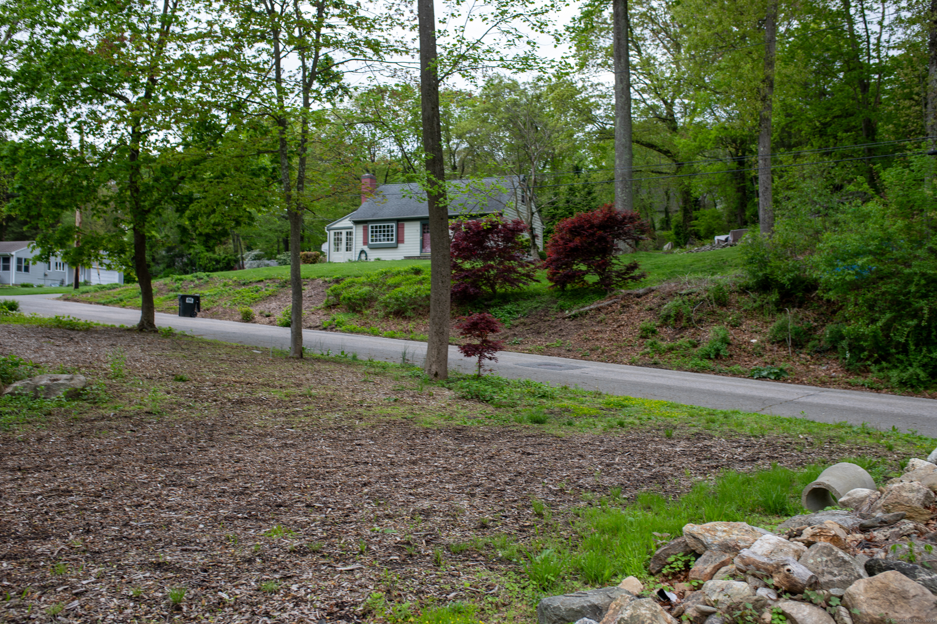 Lot 31 Valley View Road Trumbull, CT 06611 - Photo 4 of 7 a view of a house with a backyard