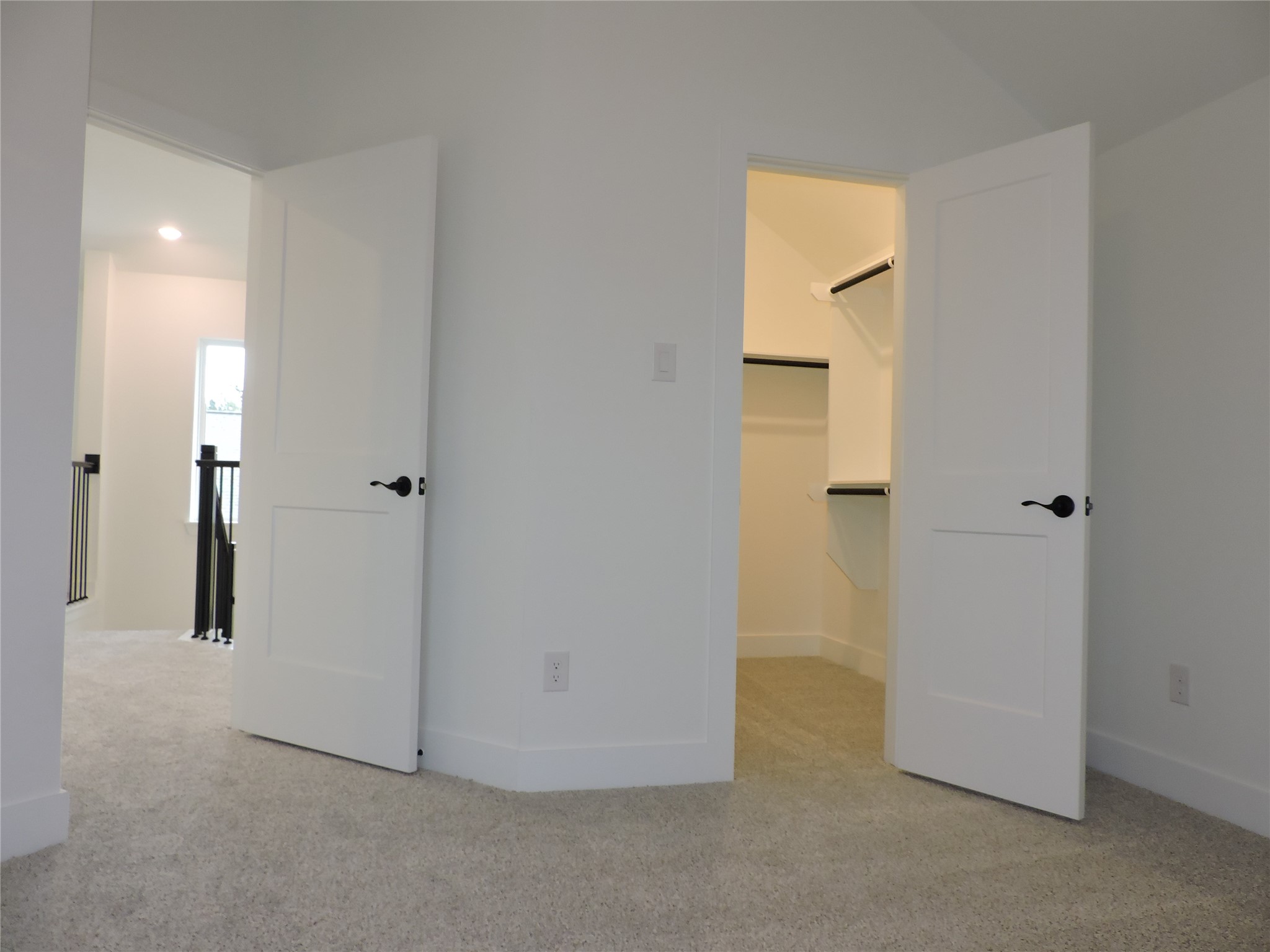 12853 Meadow Wind Way Conroe, TX 77302 - Photo 24 of 34 Secondary bedroom upstairs with large walk-in closet.
