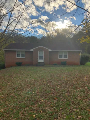 a view of house with an outdoor space