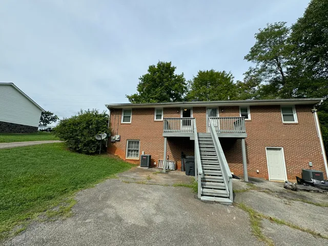 a view of a back yard of the house