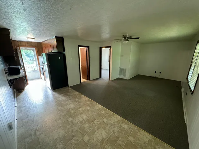 a view of a hallway with closet