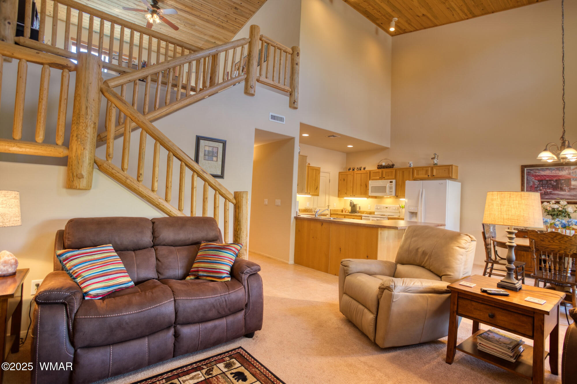 6214 West Starlight Ridge Parkway Lakeside, AZ 85929 - Photo 13 of 28 Notice the custom hand-carved railings leading to the upper level...