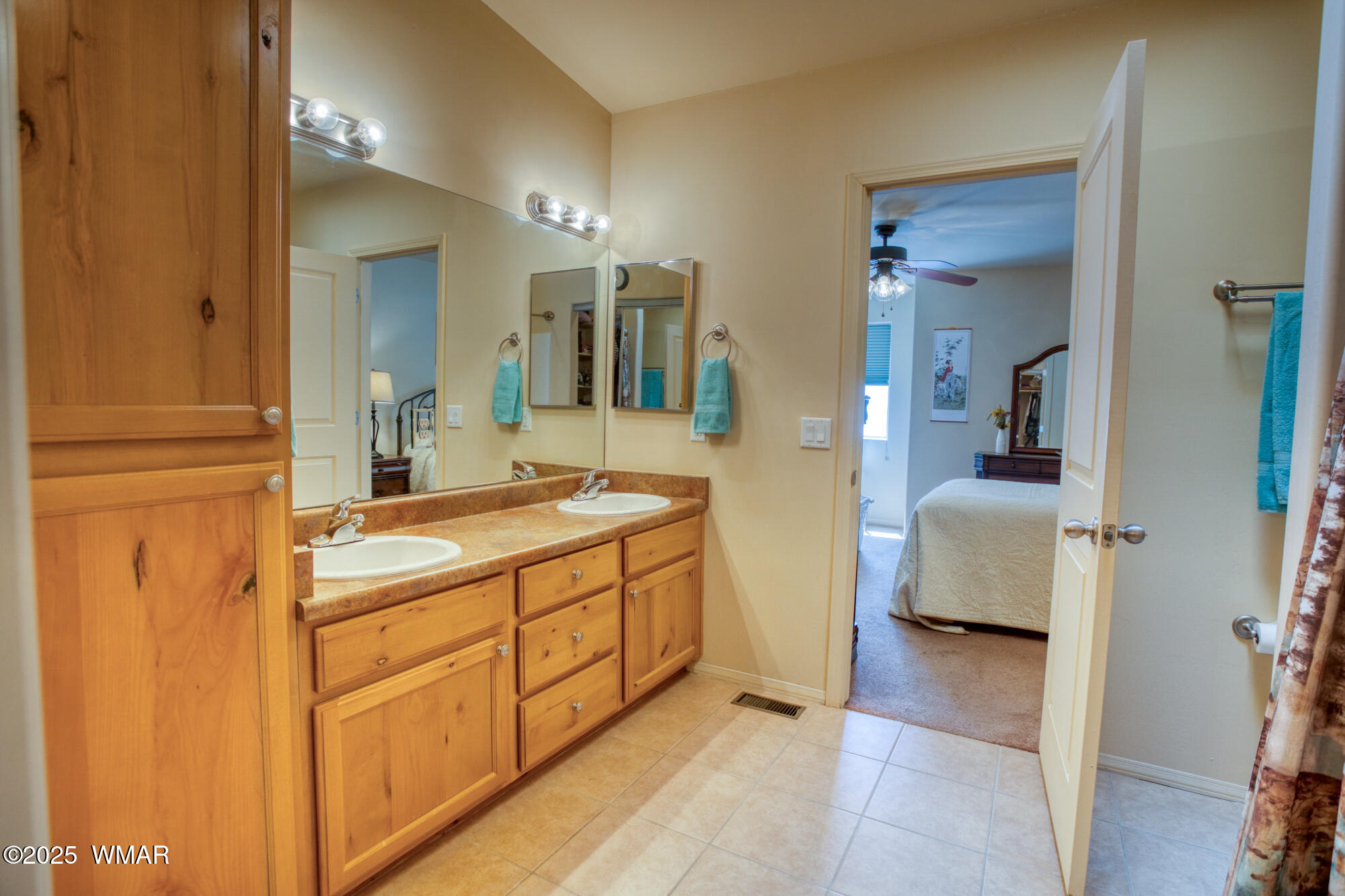 6214 West Starlight Ridge Parkway Lakeside, AZ 85929 - Photo 19 of 28 The master bathroom features dual sinks and vanities....