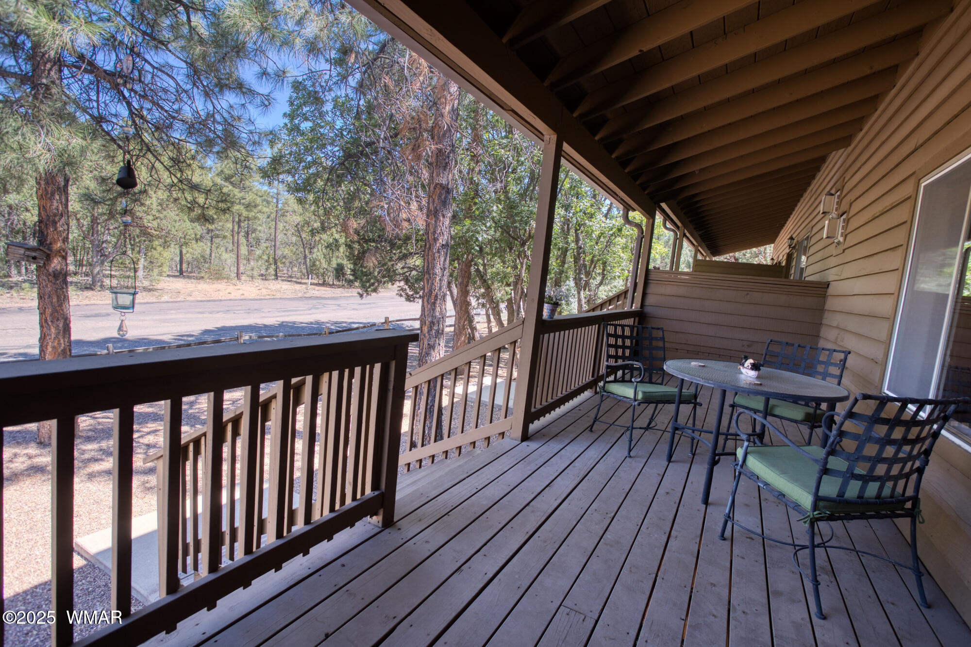 6214 West Starlight Ridge Parkway Lakeside, AZ 85929 - Photo 25 of 28 The covered rear deck is the perfect spot for a cocktail (or mocktail) on the summer evening the White Mountains are famous for...