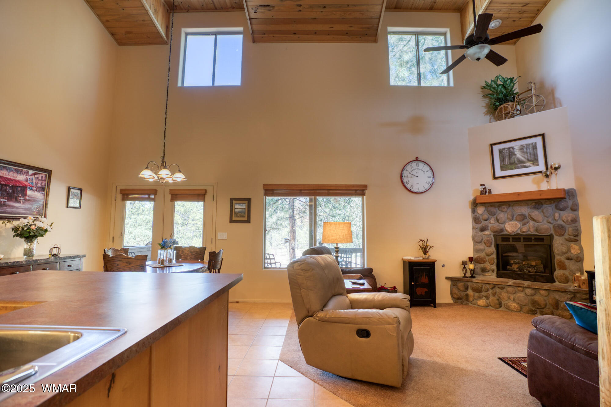 6214 West Starlight Ridge Parkway Lakeside, AZ 85929 - Photo 4 of 28 As you walk down the hallway, you see a cozy gathering place for cool summer days...or warm winter evenings!